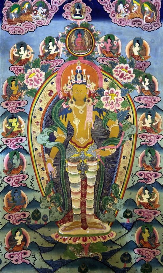 A Tibetan painted silk thangka of a Bodhisattva, early 20th century. image 74 x 47cm